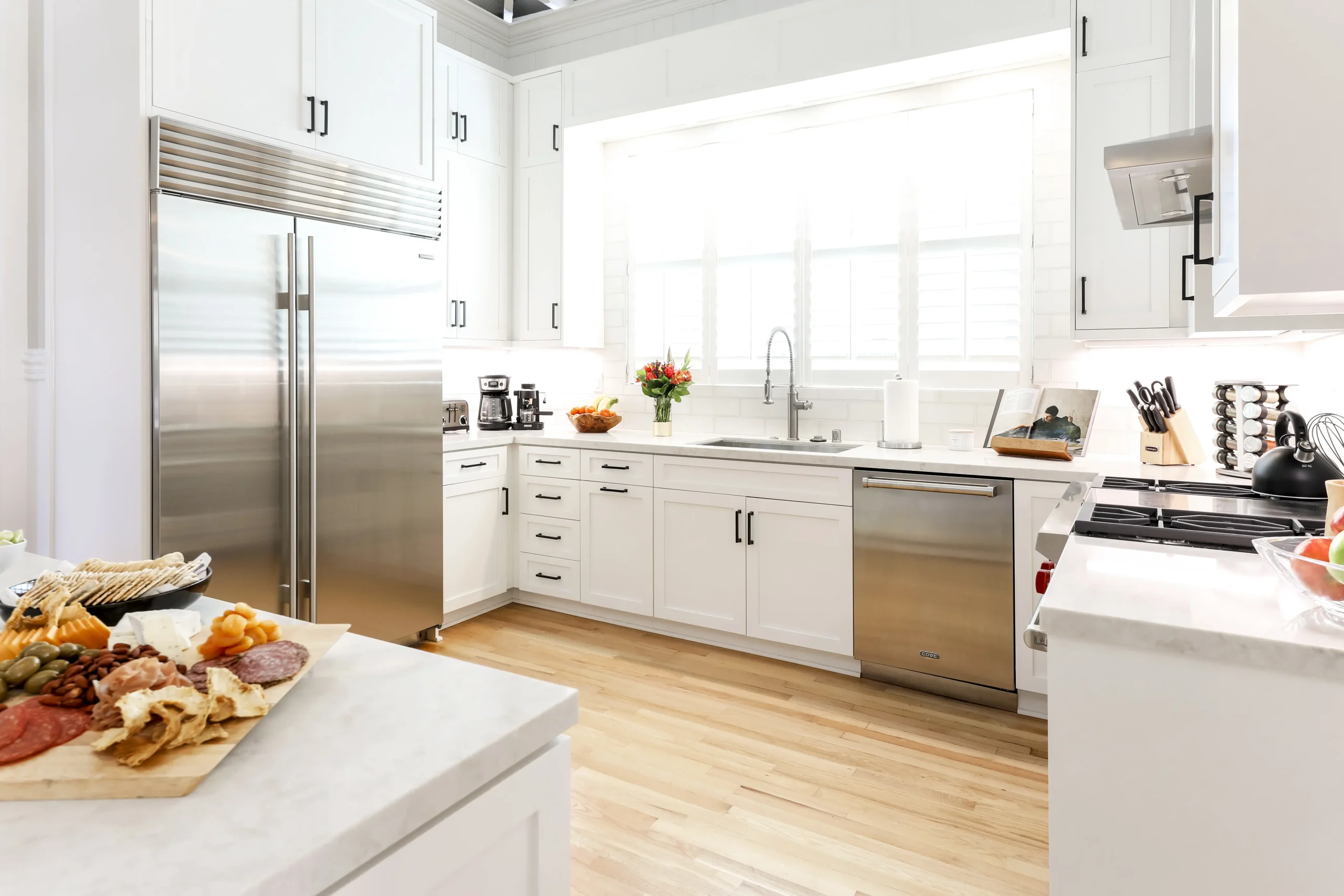 kitchen with fruit display and bright windows