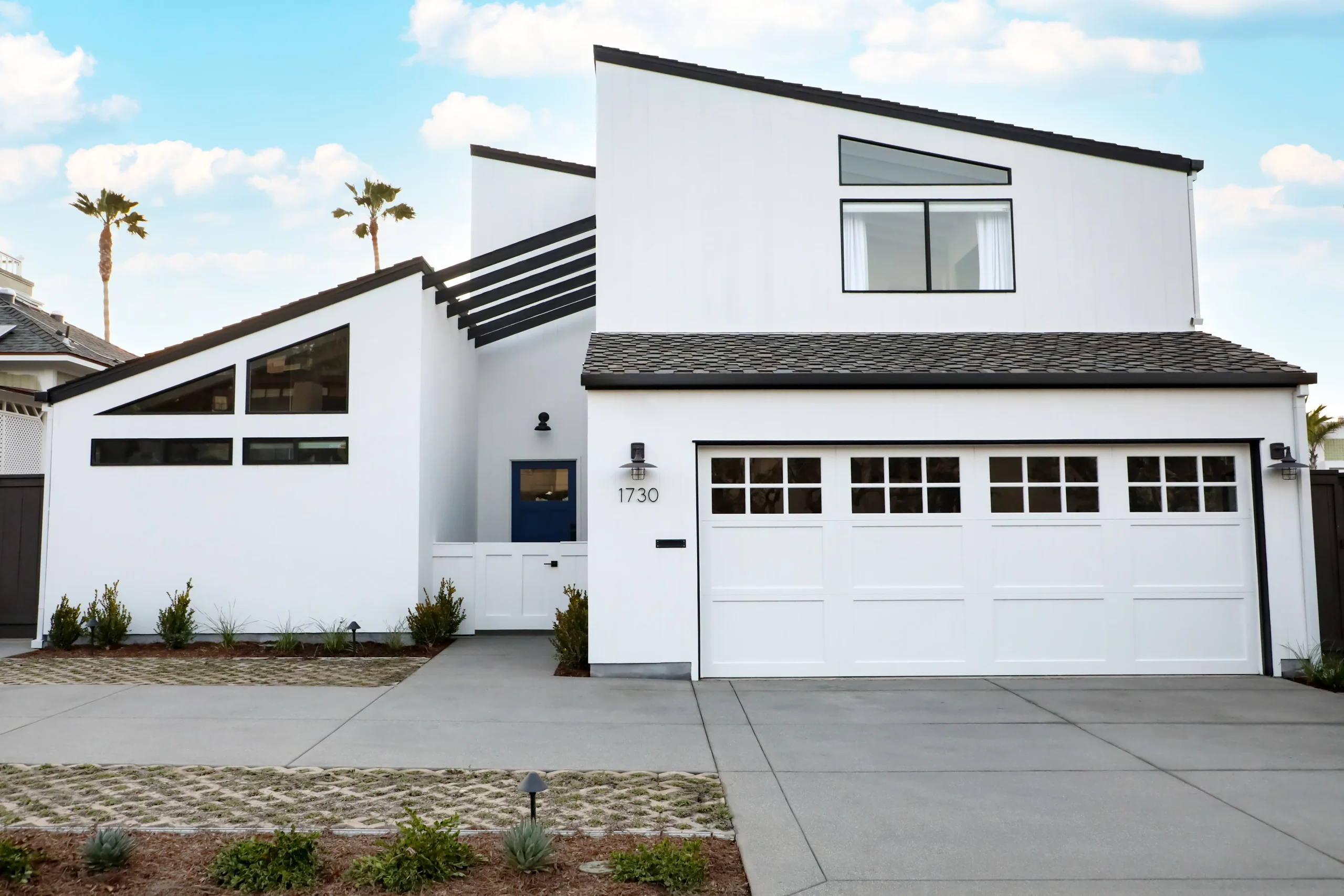 exterior of bungalow white with black trim