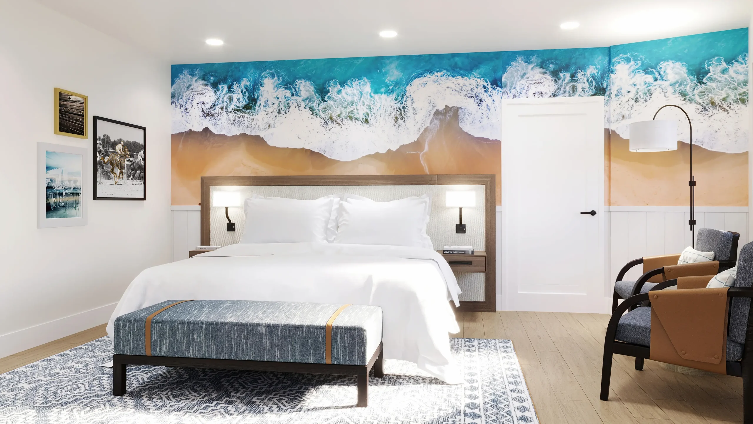 guestroom with ocean print walls bed and chair