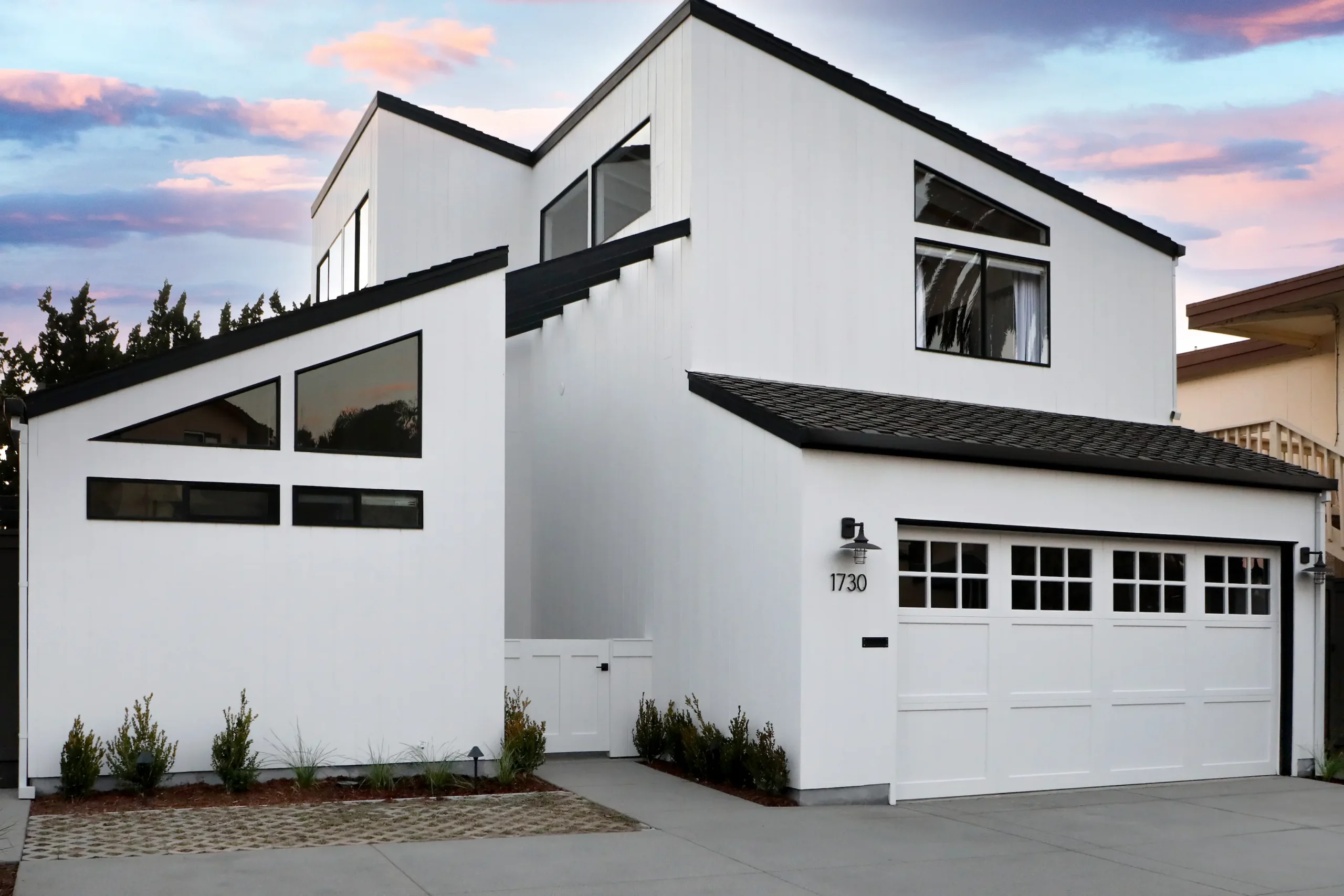 exterior of bungalow white with black trim